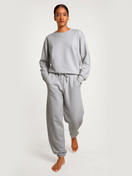 Women model is wearing Sweatshirt made of 100% Cotton in Grey, Unicoloured from the Circular Lounge series by CALIDA, Front view, Outfit