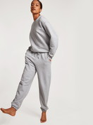 Women model is wearing Sweatshirt made of 100% Cotton in Grey, Unicoloured from the Circular Lounge series by CALIDA