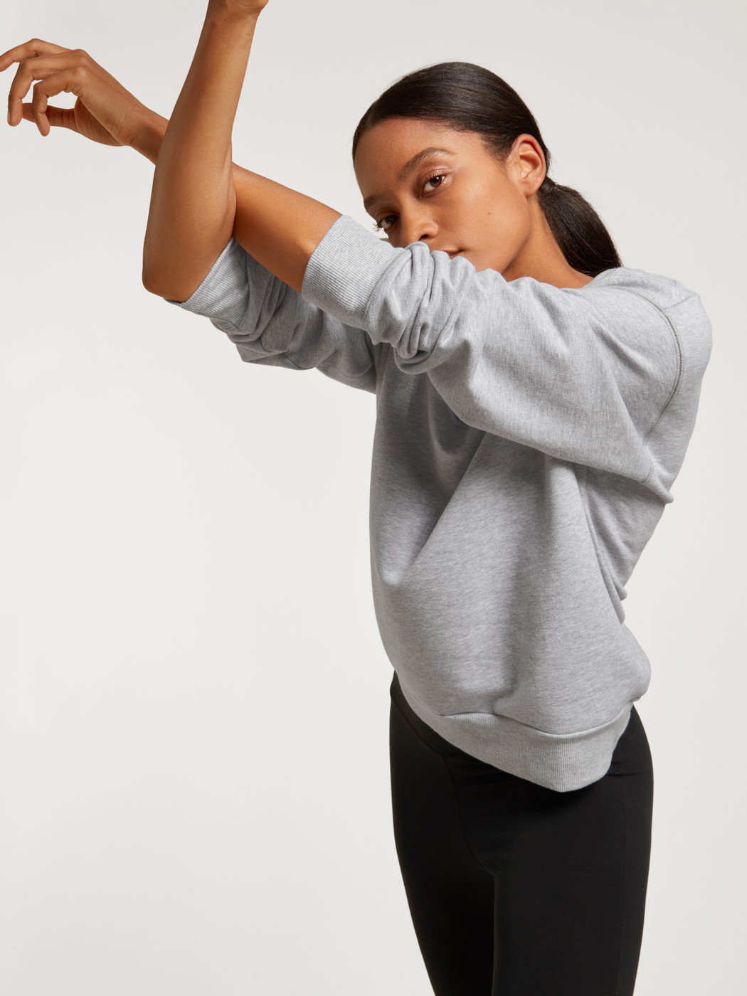 Women model is wearing Sweatshirt made of 100% Cotton in Grey, Unicoloured from the Circular Lounge series by CALIDA