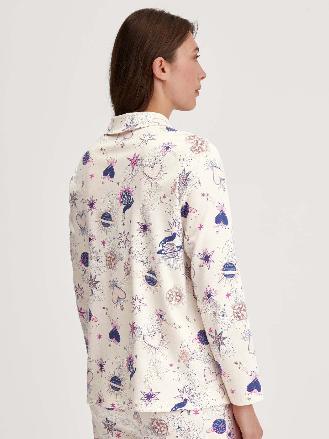 Women model is wearing Long Sleeve Shirt with Buttons made of 100% Cotton in Beige, Patterned from the Favourites Universe series by CALIDA, Back view
