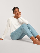 Women model is wearing Long-sleeved shirt made of Modal in White, Unicoloured from the Lounge & Relax series by CALIDA, Front view, Outfit