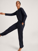 Women model is wearing Shirt long-sleeve made of Modal in Blue, Unicoloured from the DSW Balancing series by CALIDA