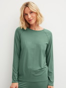 Women model is wearing Shirt long-sleeve made of Modal in Green, Unicoloured from the DSW Balancing series by CALIDA, Front view