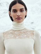 Women model is wearing Long-sleeve turtleneck shirt in wool-silk made of Wool in Beige, Lace from the Silky Wool Glam series by CALIDA, Front view