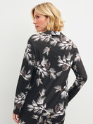 Women model is wearing Long Sleeve Shirt with Buttons – TENCEL™ Modal and Silk Blend made of Modal in Black, Floral from the Glimmer M&M series by CALIDA, Back view