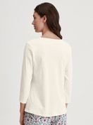 Women model is wearing Shirt 3/4 sleeve made of 100% Cotton in Beige, Unicoloured from the Favourites Botanic series by CALIDA, Back view