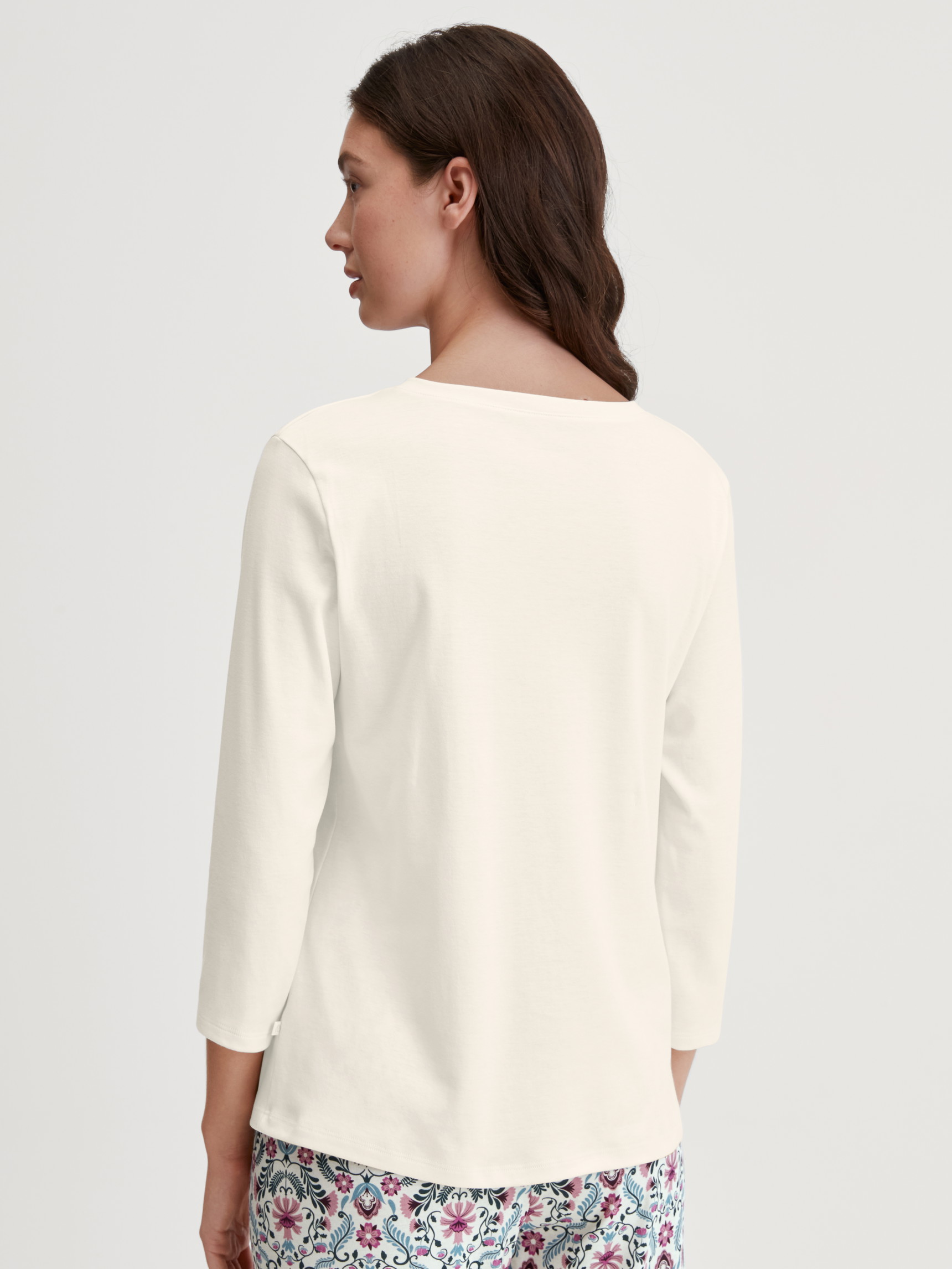 Women model is wearing Shirt 3/4 sleeve made of 100% Cotton in Beige, Unicoloured from the Favourites Botanic series by CALIDA, Back view
