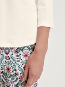 Women model is wearing Shirt 3/4 sleeve made of 100% Cotton in Beige, Unicoloured from the Favourites Botanic series by CALIDA, Detail