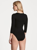 Women model is wearing Bodysuit made of Cotton in Black, Unicoloured from the Natural Comfort series by CALIDA, Back view