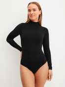 Women model is wearing Shapewear longsleeve Body made of Polyamide in Black, Unicoloured from the Seamless Shape series by CALIDA, Front view