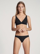 Women model is wearing String made of Cotton in Black, Unicoloured from the Natural Comfort series by CALIDA, Outfit, Front view