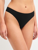 Women model is wearing String made of Modal in Black, Unicoloured from the Seamless Natural series by CALIDA, Front view