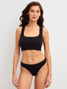 Women model is wearing String made of Modal in Black, Unicoloured from the Seamless Natural series by CALIDA, Outfit