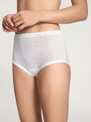 Women model is wearing Brief made of 100% Cotton in White, Unicoloured from the Iconics series by CALIDA, Front view