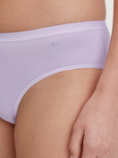 Women model is wearing Brief, regular cut made of Cotton in Purple, Unicoloured from the Natural Comfort series by CALIDA, Detail