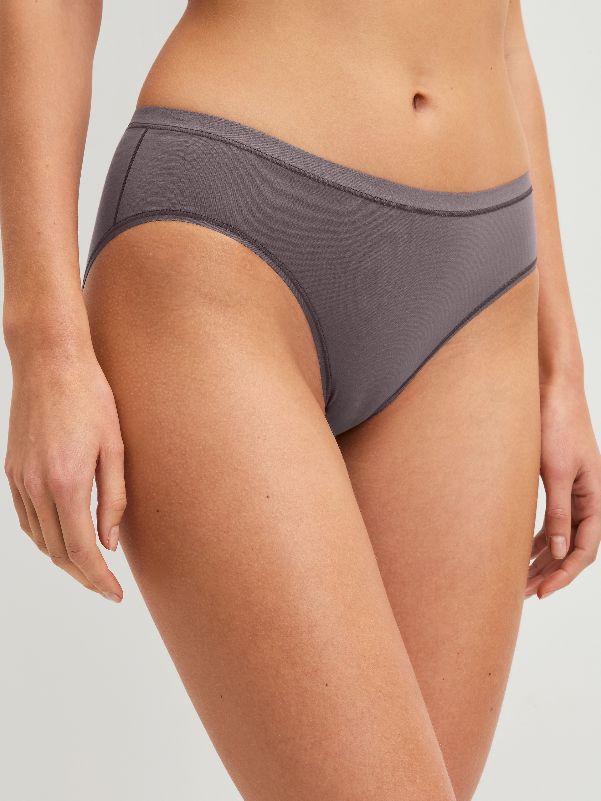 Women model is wearing Brief, regular cut made of Cotton in Brown, Unicoloured from the Natural Comfort series by CALIDA, Front view