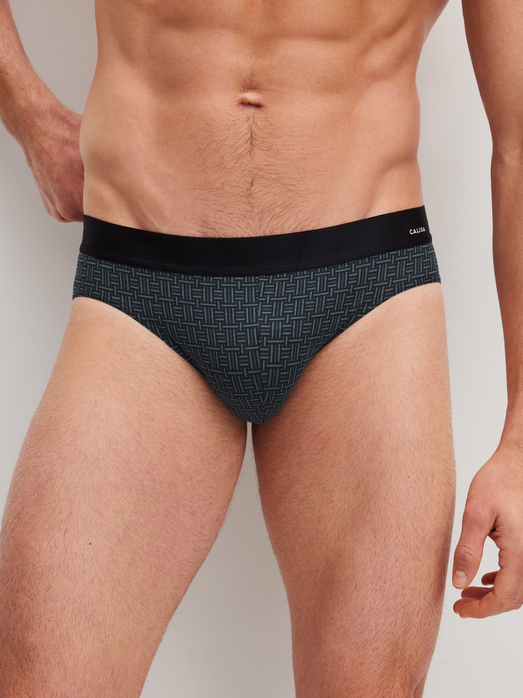 Men model is wearing Brief made of Cotton in Black, Patterned from the Cotton Code Design series by CALIDA, Front view