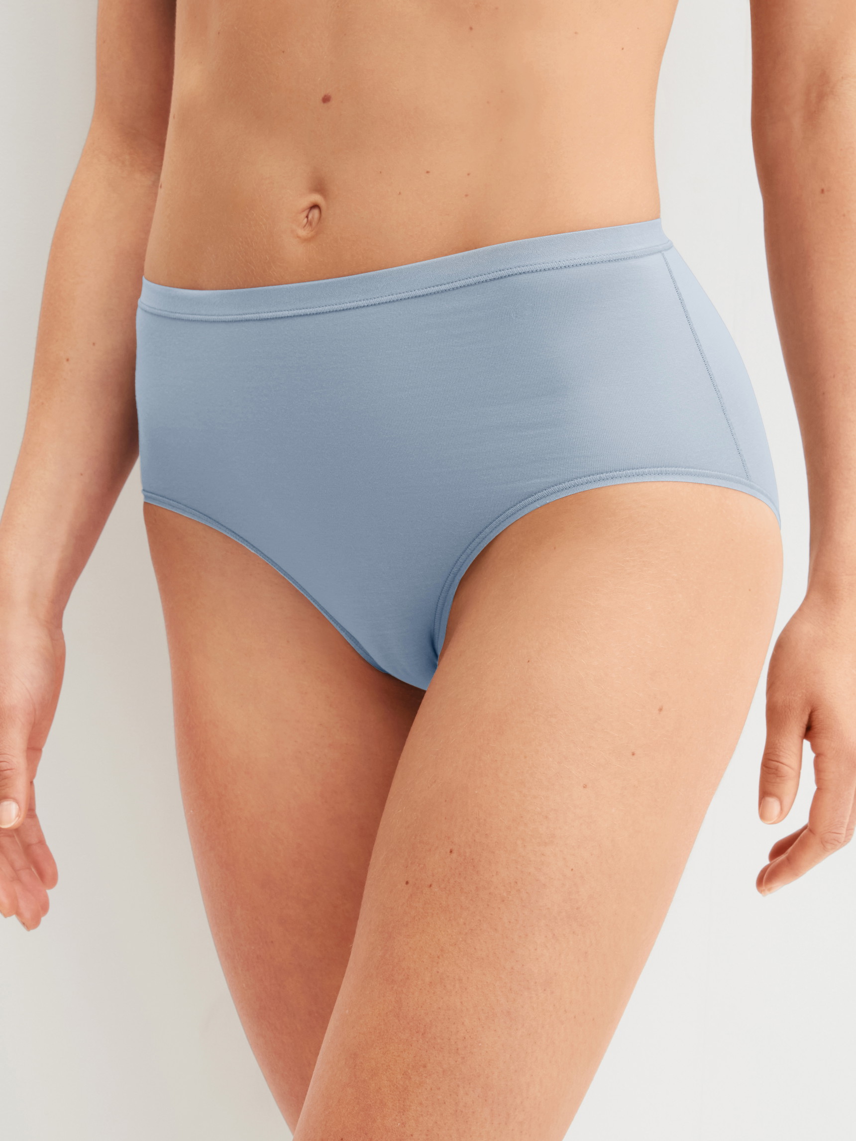 Women model is wearing Brief made of Swiss+Cotton in Grey, Unicoloured from the Natural Comfort series by CALIDA, Front view