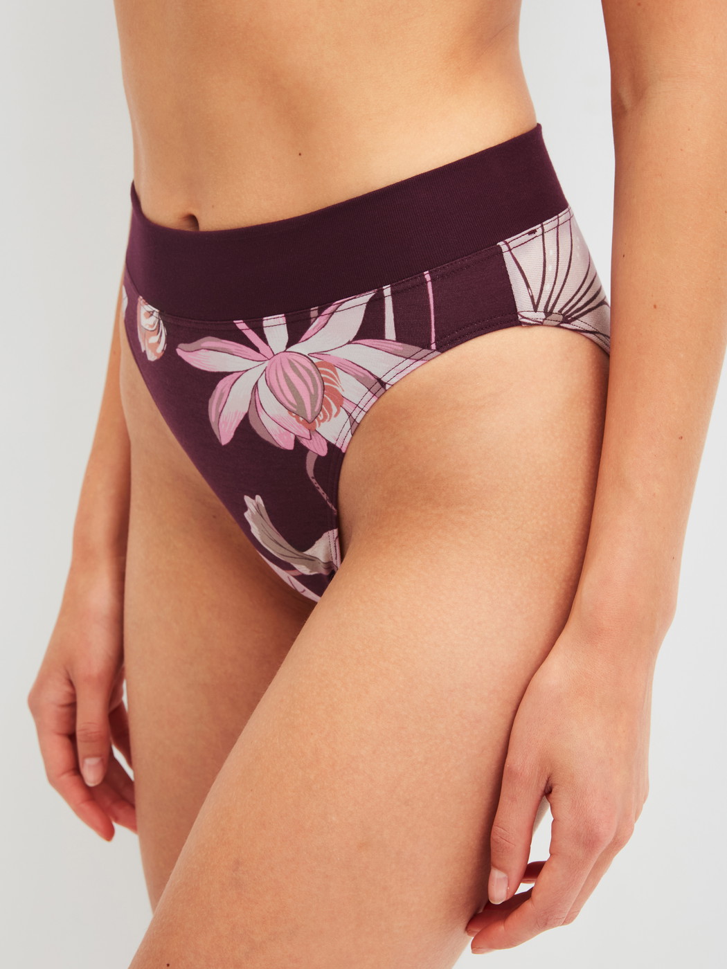 Women model is wearing Brief, high waist made of Cotton in Red, Floral from the Elastic Trend Spec. series by CALIDA, Front view