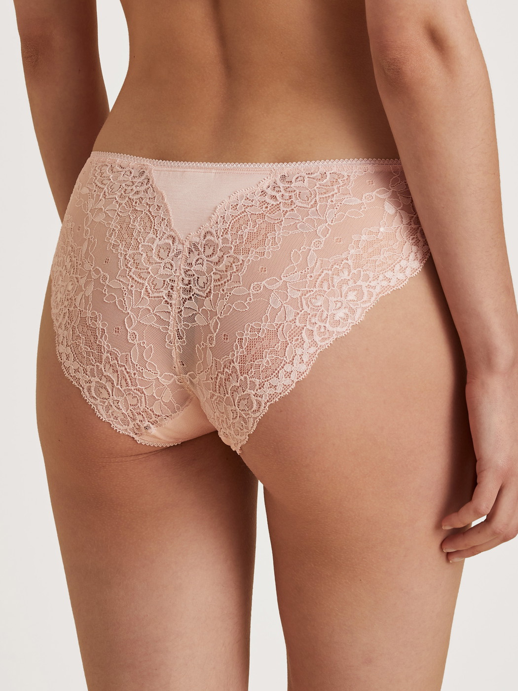 Le mannequin Femme porte le/la Culotte en Viscose de couleur Rose, Dentelle, de la série Sensual Secrets de CALIDA, Vue arrière