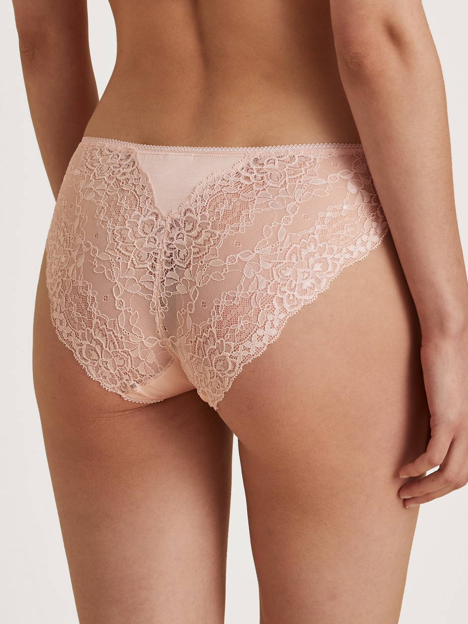 Women model is wearing Brief, regular cut made of Viscose in Pink, Lace from the Sensual Secrets series by CALIDA, Back view