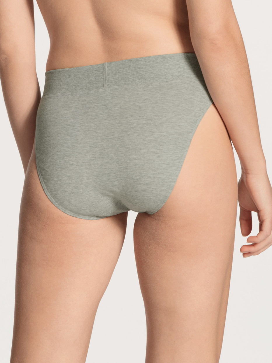 Women model is wearing Brief, high waist made of Cotton in Grey, Unicoloured from the Elastic series by CALIDA, Back view