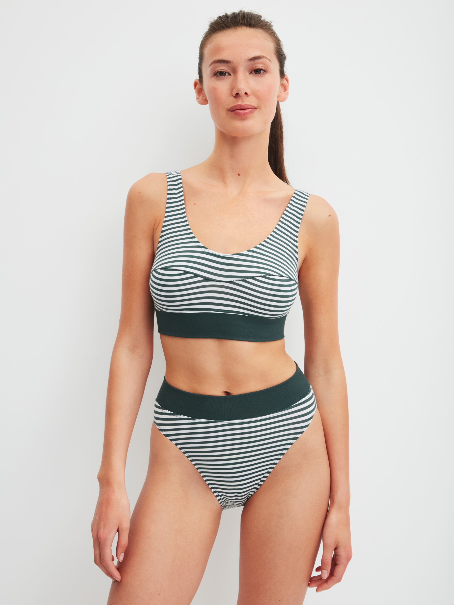 Women model is wearing Brief made of Cotton in Green, Striped from the Elastic Special series by CALIDA, Outfit