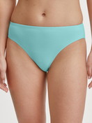 Women model is wearing Slip, regular cut made of Cotton in Turquoise, Unicoloured from the Nat. Comfort Xtra series by CALIDA, Front view