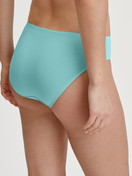 Women model is wearing Slip, regular cut made of Cotton in Turquoise, Unicoloured from the Nat. Comfort Xtra series by CALIDA, Back view