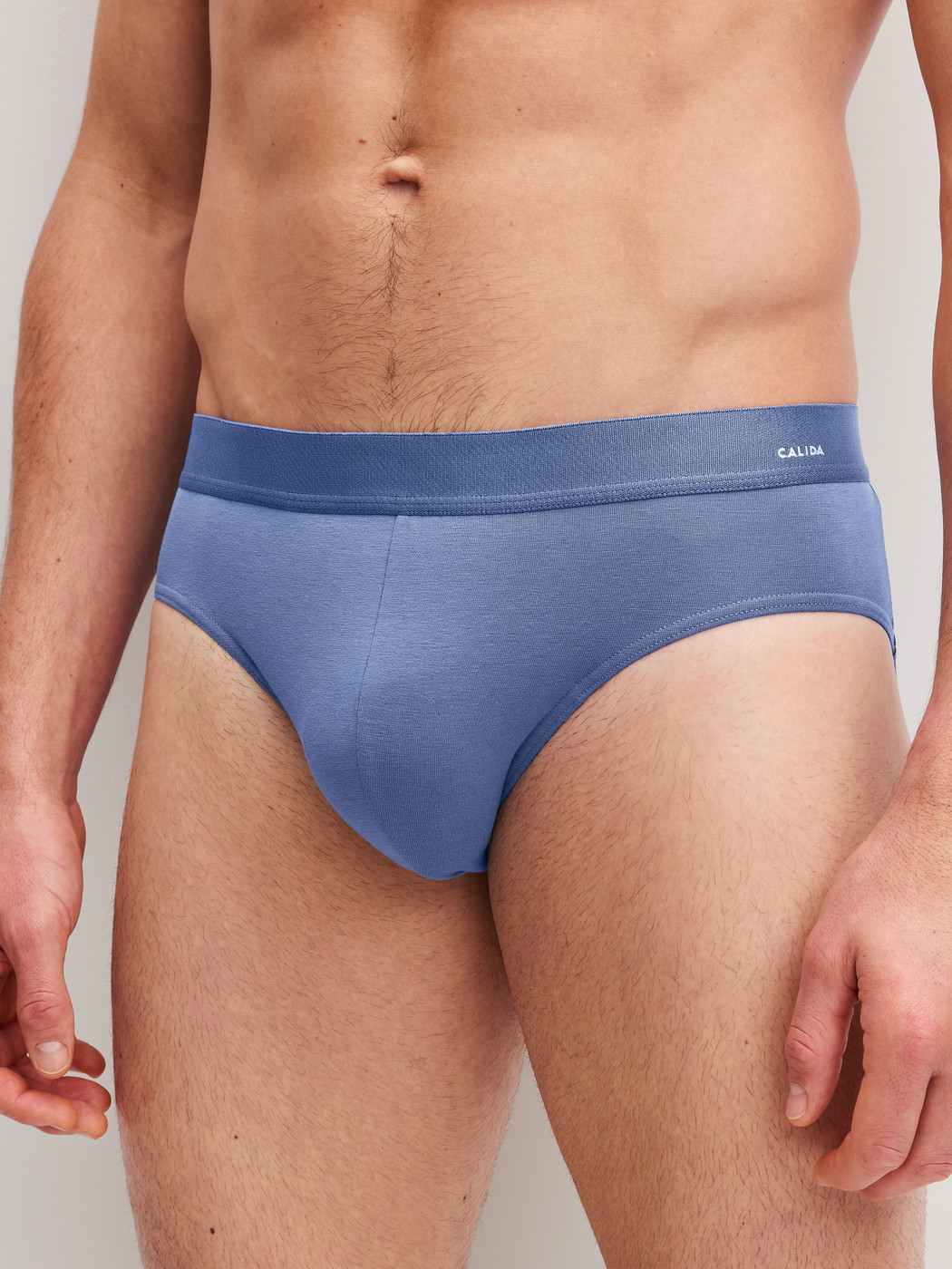 Men model is wearing Brief made of Cotton in Grey, Unicoloured from the Cotton Code series by CALIDA, Front view