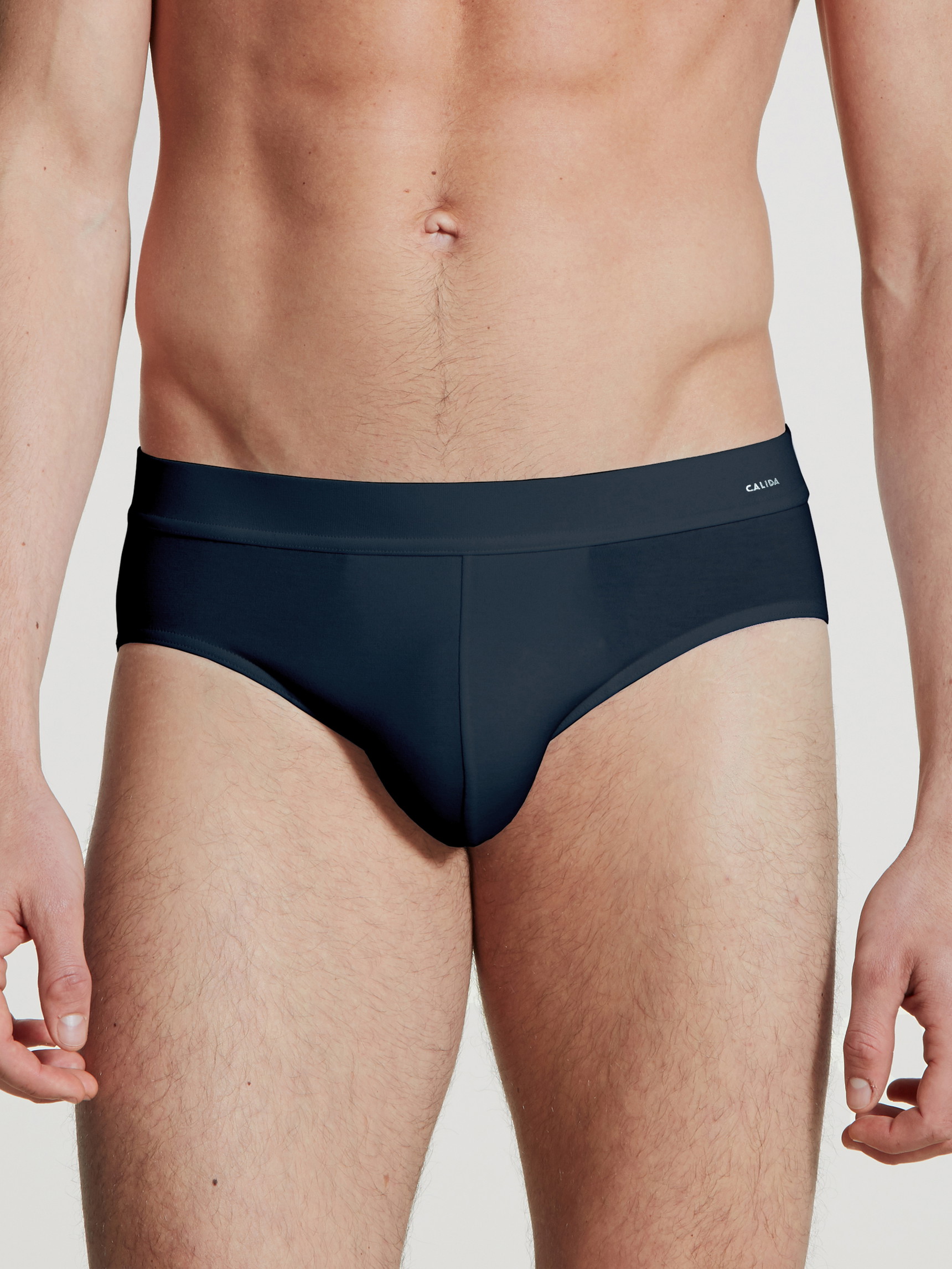 Men model is wearing Brief made of Cotton in Blue, Unicoloured from the Cotton Code series by CALIDA, Front view