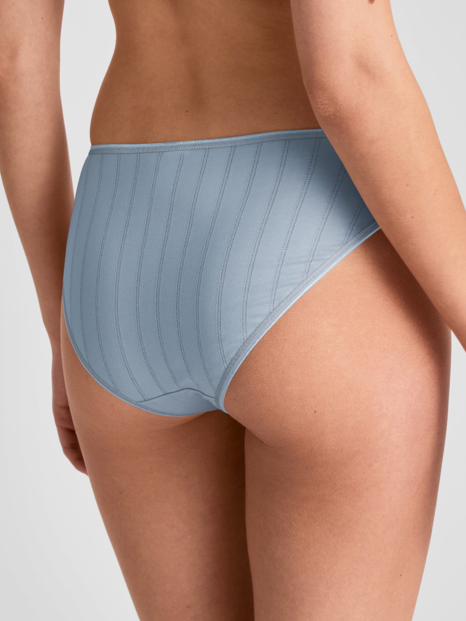 Women model is wearing Brief, regular cut made of Cotton in Blue, Lace from the Etude Toujours series by CALIDA, Back view