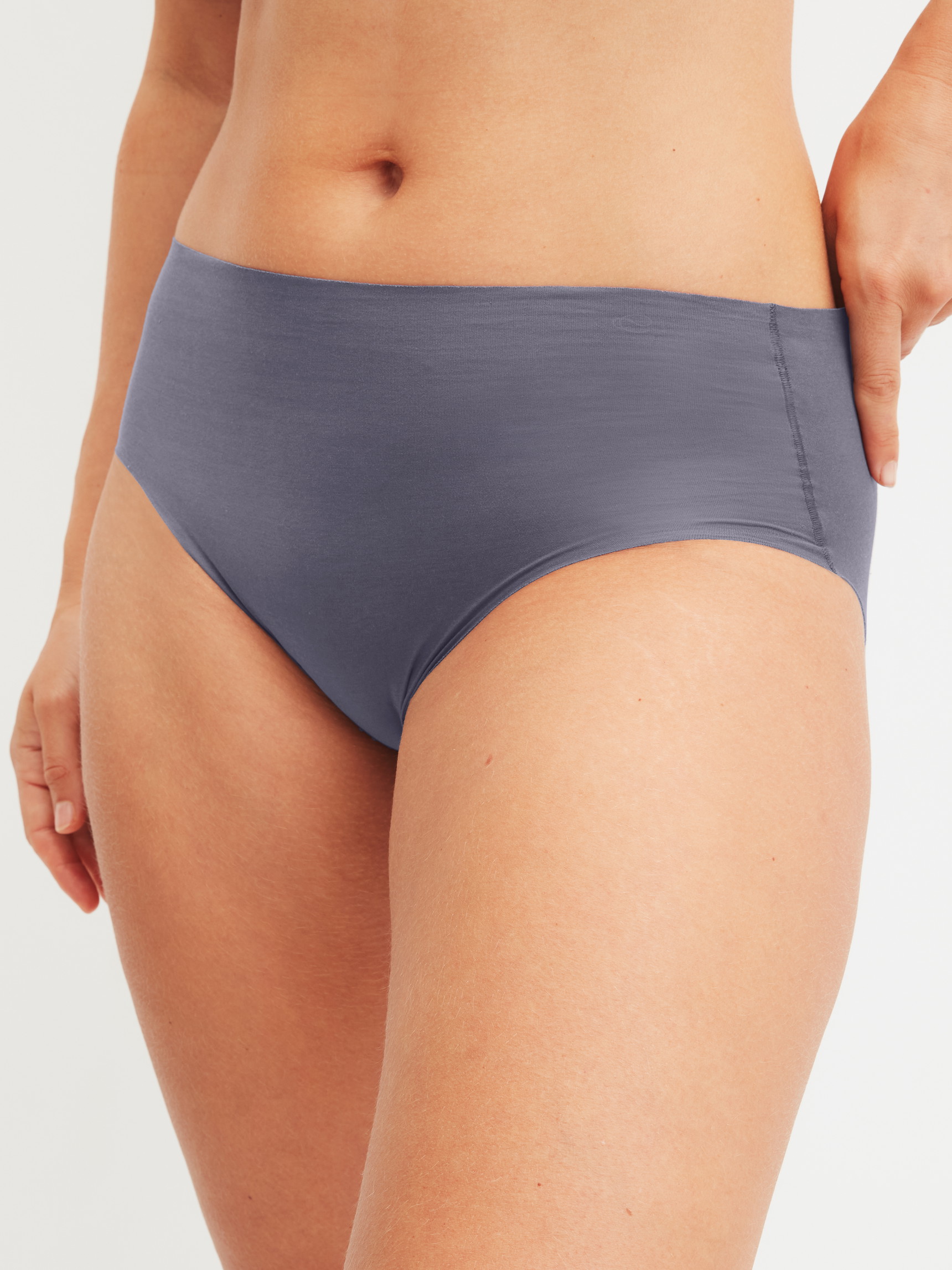 Women model is wearing Brief made of Modal in Grey, Unicoloured from the Natural Skin series by CALIDA, Front view