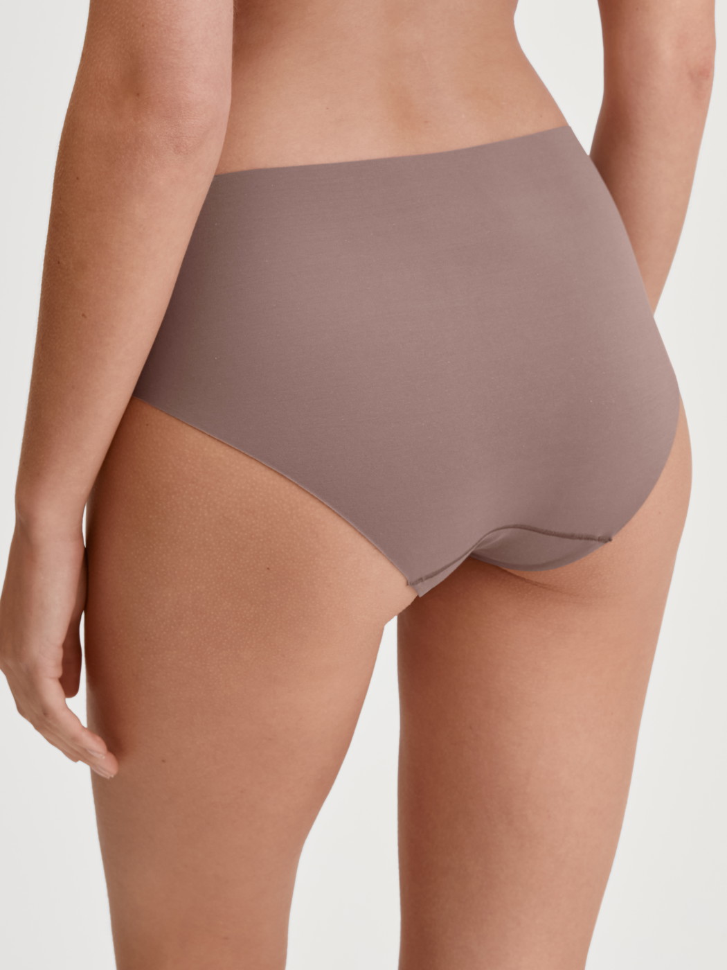 Women model is wearing Brief made of Modal in Brown, Unicoloured from the Natural Skin series by CALIDA, Front view