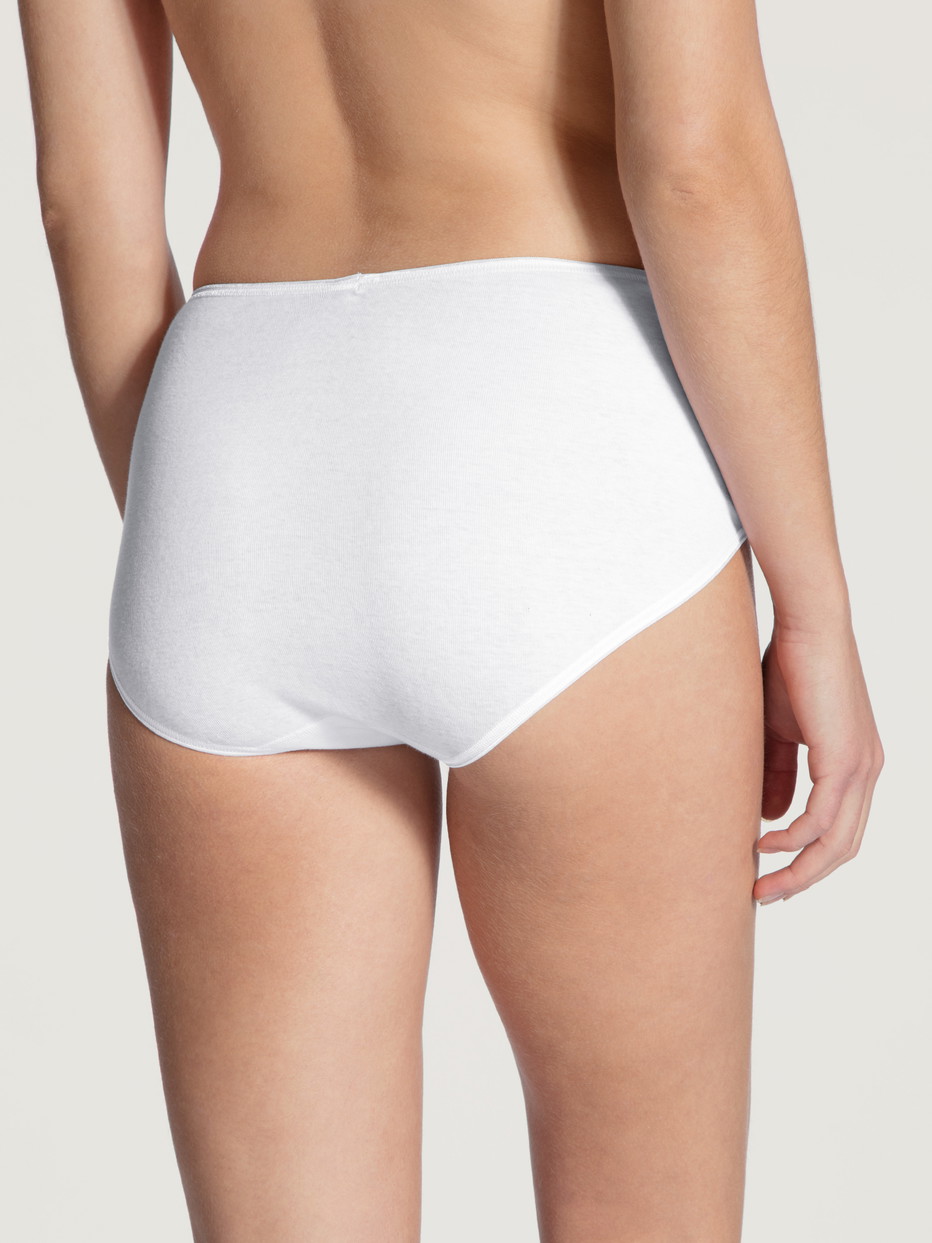 La modella / Il modello Donna indossa Midi-slip in 100% cotone di colore Bianco, Pizzo, della serie Feminin Sense di CALIDA, Vista posteriore