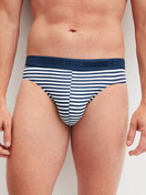 Men model is wearing Brief made of Cotton in Blue, Striped from the Grafic Cotton series by CALIDA, Front view
