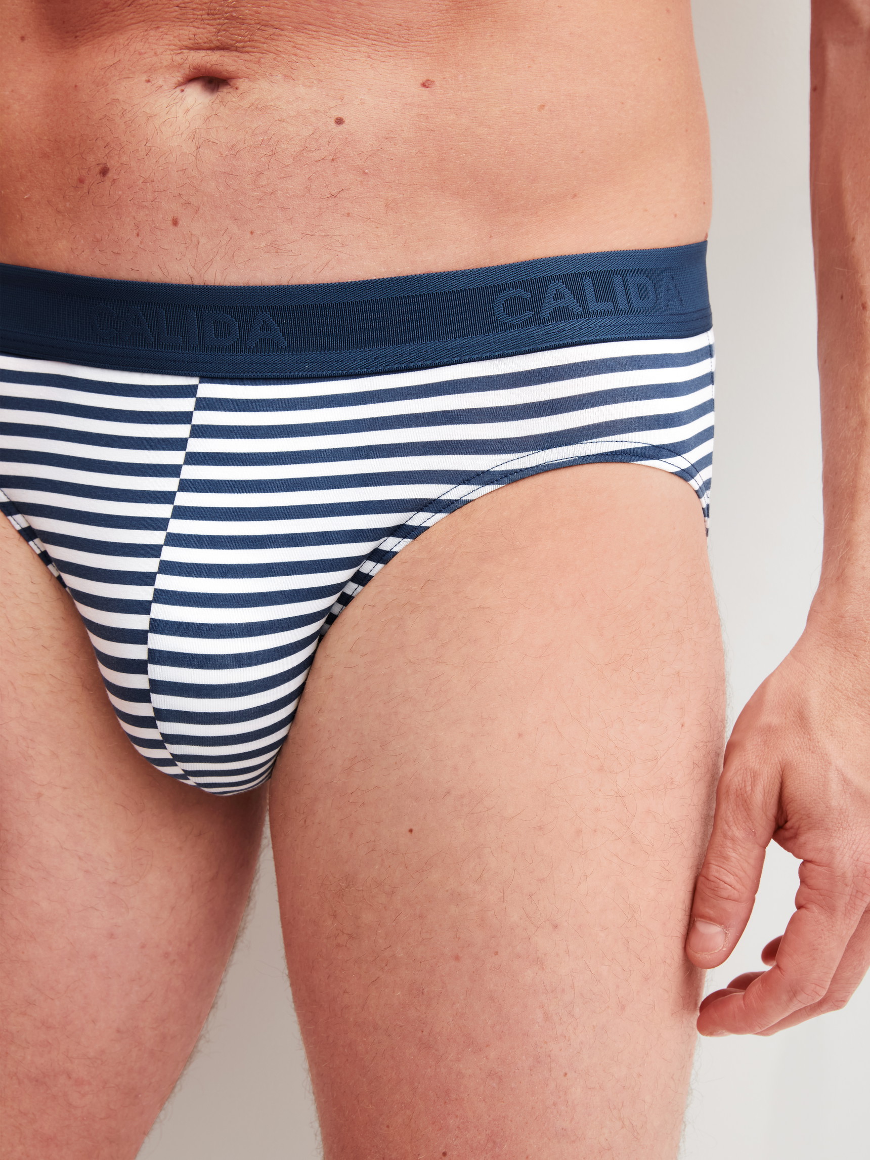 Men model is wearing Brief made of Cotton in Blue, Striped from the Grafic Cotton series by CALIDA, Detail