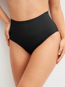 Women model is wearing Shapewear brief made of Polyamide in Black, Unicoloured from the Seamless Shape series by CALIDA, Front view