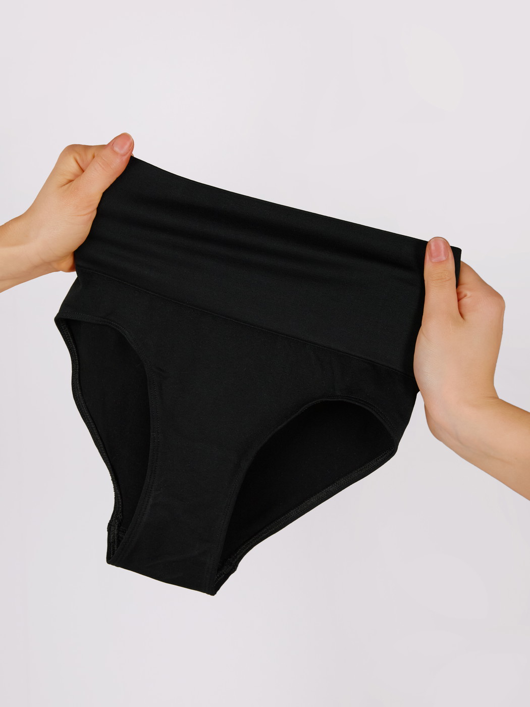 Women model is wearing Shapewear brief made of Polyamide in Black, Unicoloured from the Seamless Shape series by CALIDA, Additional Image