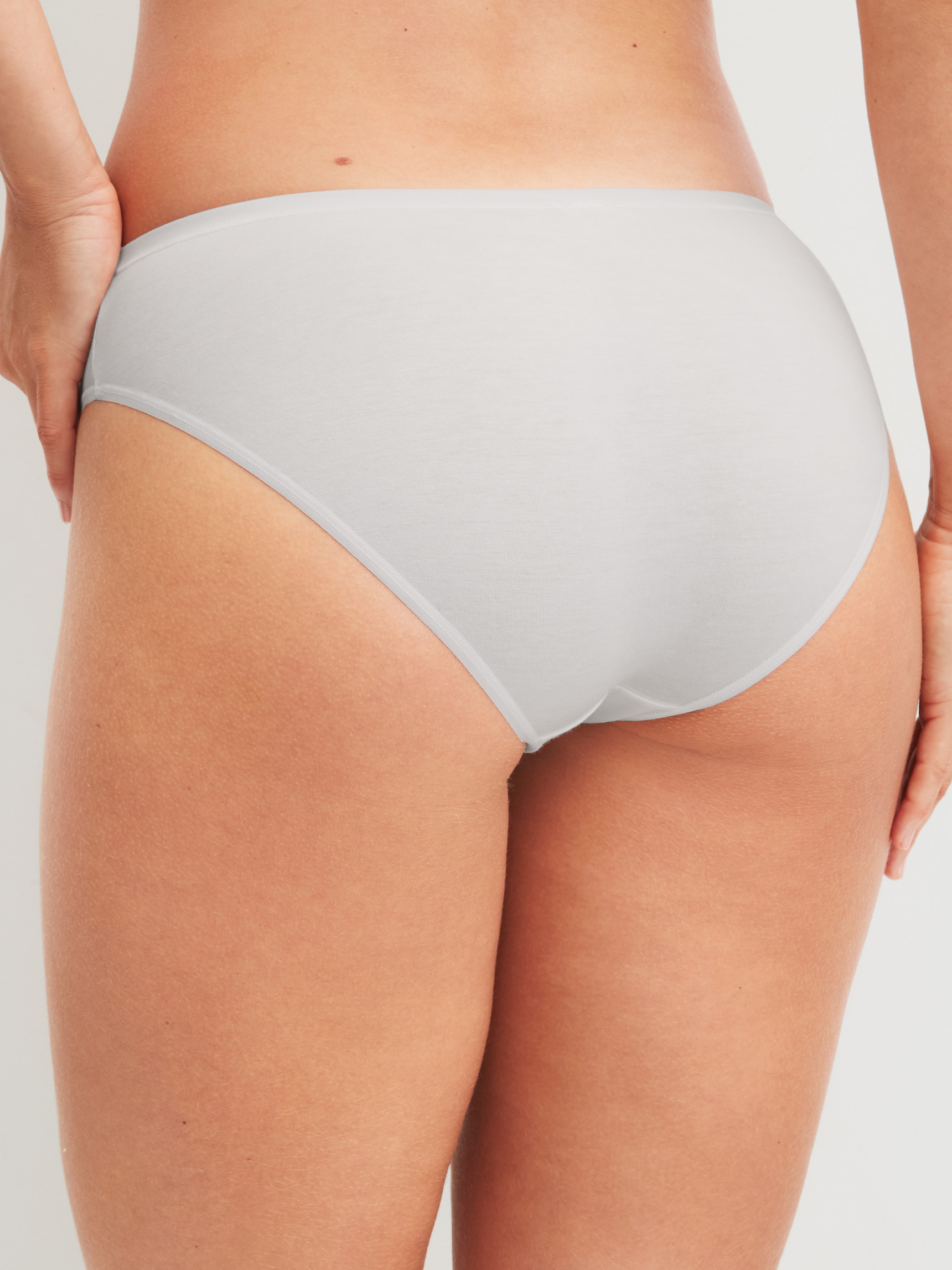 Women model is wearing Briefs, 2-Pack made of Cotton in Blue, Unicoloured from the Benefit Women Spec. series by CALIDA, Additional Image