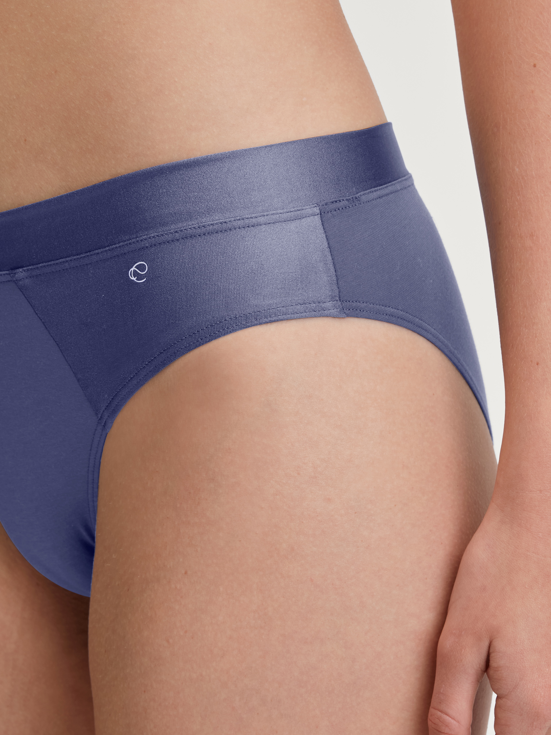 Women model is wearing Brief made of Cotton in Blue, Unicoloured from the Cate series by CALIDA, Front view