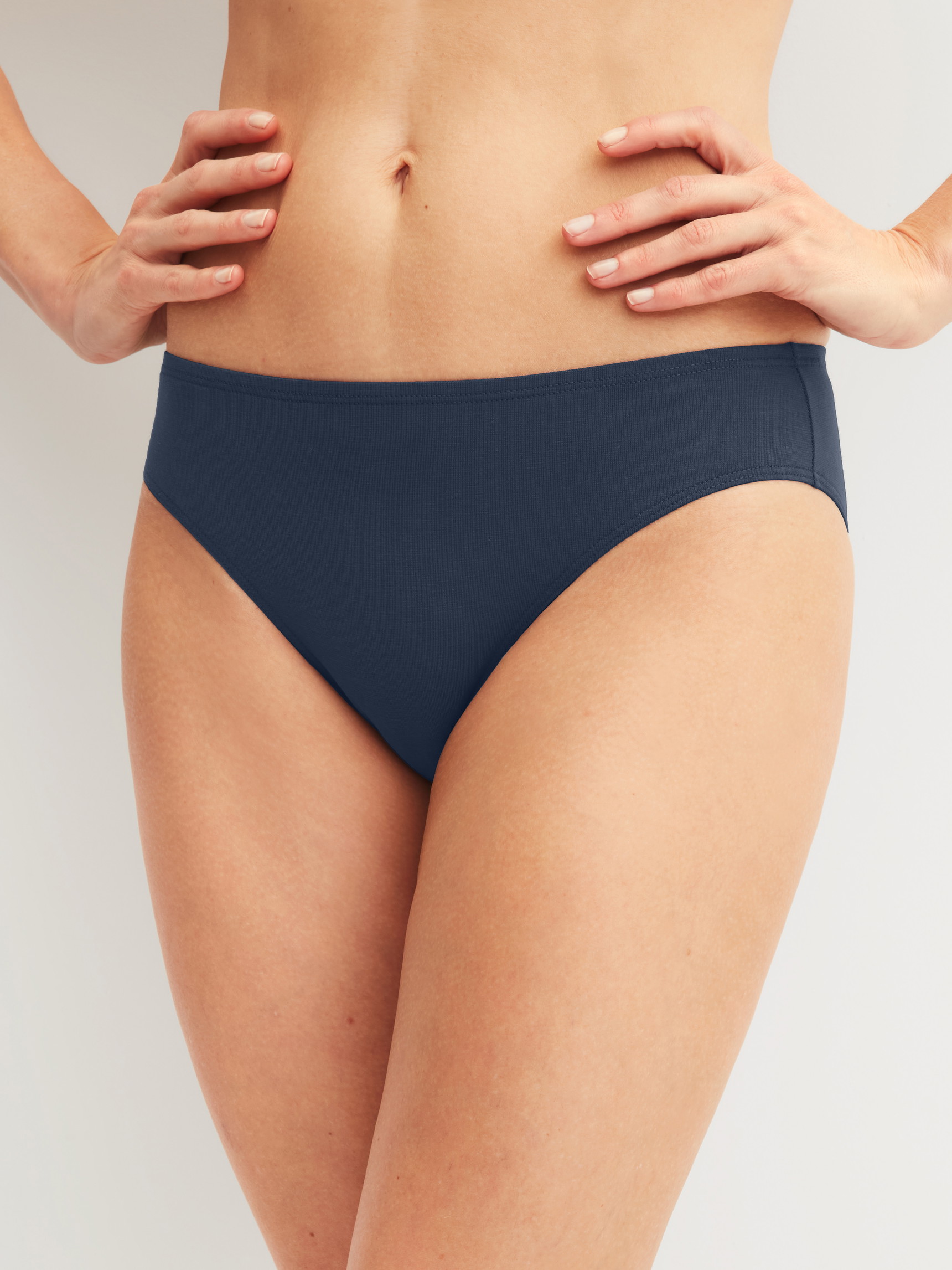 Women model is wearing Brief, regular cut made of Cotton in Blue, Unicoloured from the Essential Cotton Spe series by CALIDA, Front view