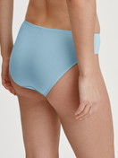 Women model is wearing Brief, regular cut made of Cotton in Blue, Unicoloured from the Essential Cotton series by CALIDA, Back view