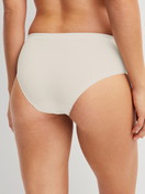 Damen-Model trägt Slip aus Modal in Weiß, Einfarbig aus Serie Seamless Natural von CALIDA, Rückansicht