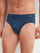 Men model is wearing Slip made of Modal in Blue, Unicoloured from the Balanced Day series by CALIDA, Front view