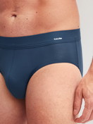 Men model is wearing Slip made of Modal in Blue, Unicoloured from the Balanced Day series by CALIDA, Detail