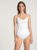 Women model is wearing Midi brief made of 100% Cotton in White, Unicoloured from the Light series by CALIDA, Outfit, Front view