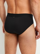 Men model is wearing Brief made of Modal in Black, Unicoloured from the Clean Line series by CALIDA, Back view