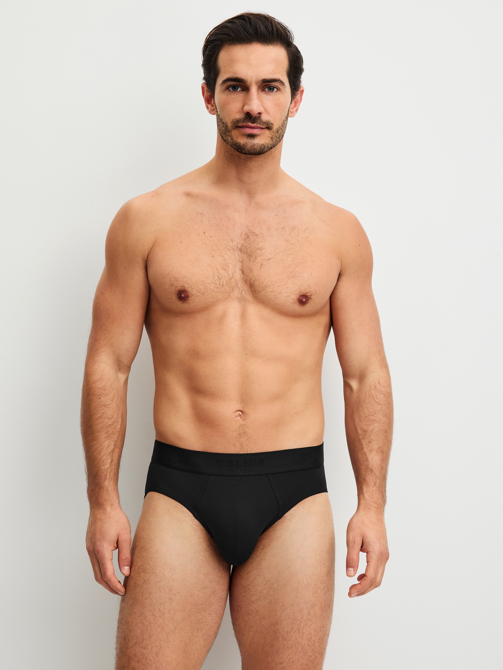 Men model is wearing Brief made of Modal in Black, Unicoloured from the Clean Line series by CALIDA, Outfit