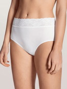 Women model is wearing Midi brief made of 100% Cotton in White, Lace from the Iconics series by CALIDA, Front view